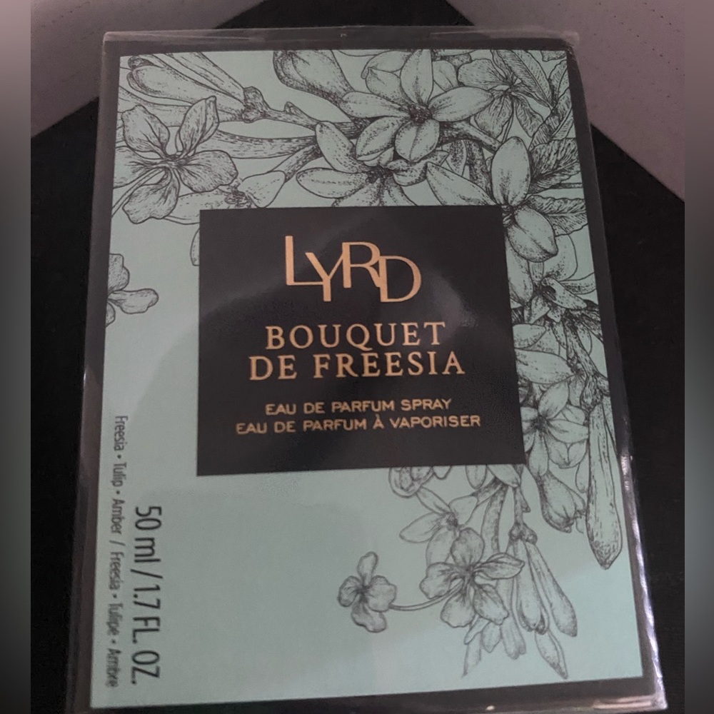 Avon/Lyrd bouquet de freesia perfume 1.7oz